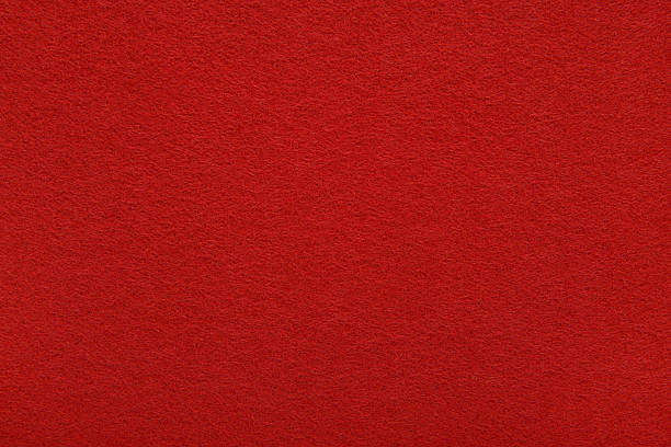istock Red felt texture background - close-up of soft fabric surface. Seamless background, graphic design, scrapbooking, textile layouts, creative projects. 2218647501