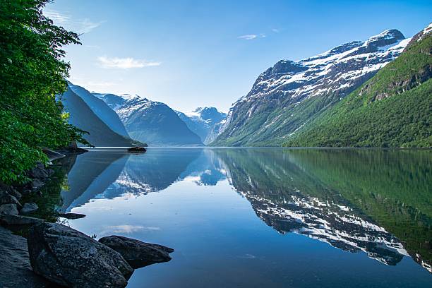 istock Norwegian fjord landscape with reflective waters. 2218648658