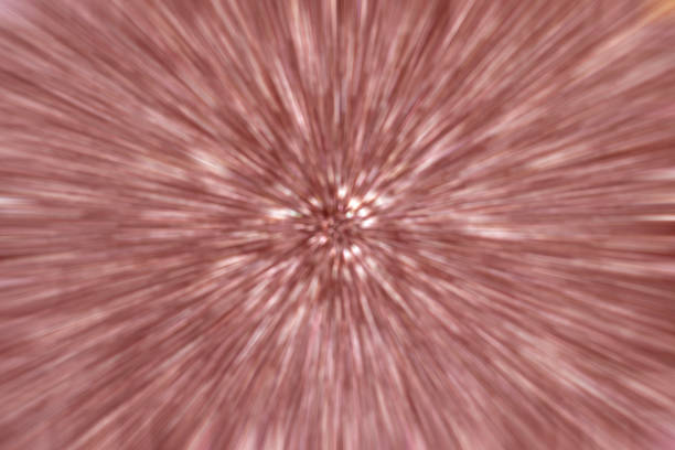 Blurred zoom effect image in soft pink tones for abstract backgrounds