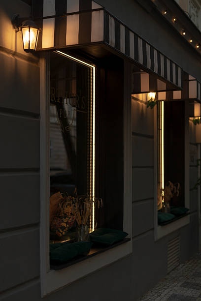 istock Evening Restaurant Windows Glowing with Warm Lighting and Atmosphere 2218649341