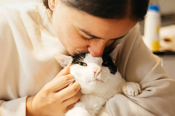 istock Woman kissing a cat 2218650370