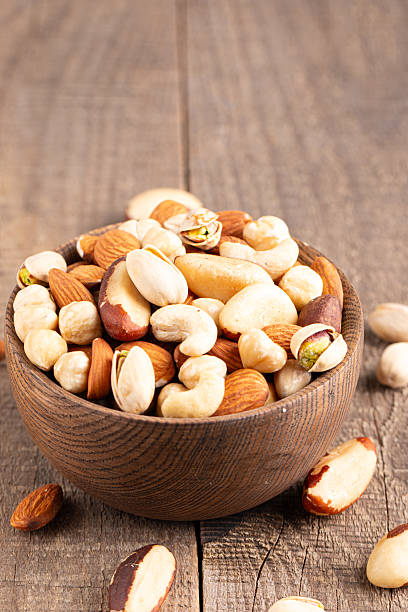 istock Healthy mix nuts. Almonds, hazelnuts, cashews, peanuts, pistachios, Brazil nuts 2218651740