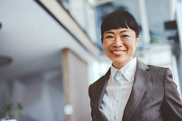 istock Asian corporate employee portrait in office environment 2218652550