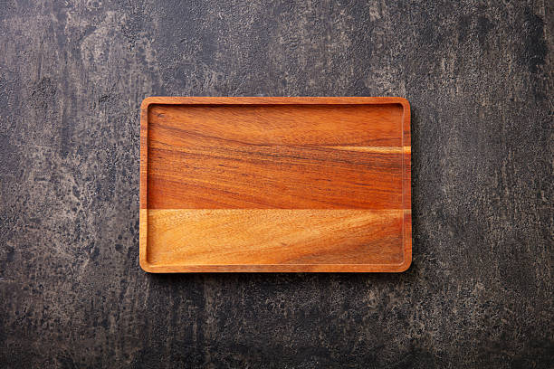 istock Wooden cutting board. Dark background. Copy space. Top view. 2218653355