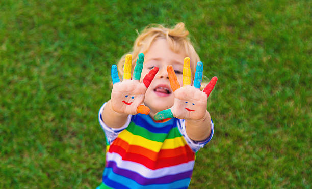 istock Child in hand draw smile. Selective focus. 2218653539
