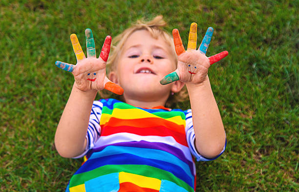 istock Child in hand draw smile. Selective focus. 2218653548