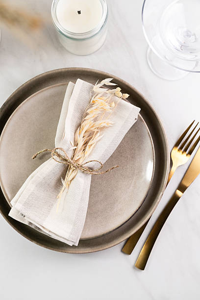 istock Elegant minimal table setting with wheat decoration in neutral tones 2218659579