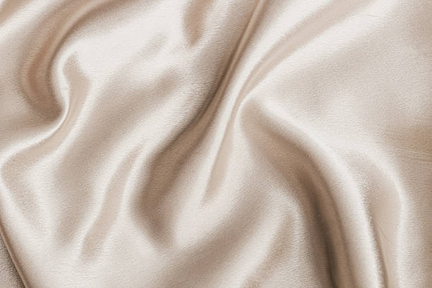 istock Soft satin fabric draped elegantly with gentle folds and a smooth surface 2218659777