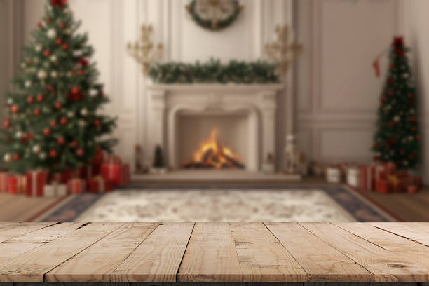 istock Empty table in front of christmas tree with decorations background. For product display montage 2218660700