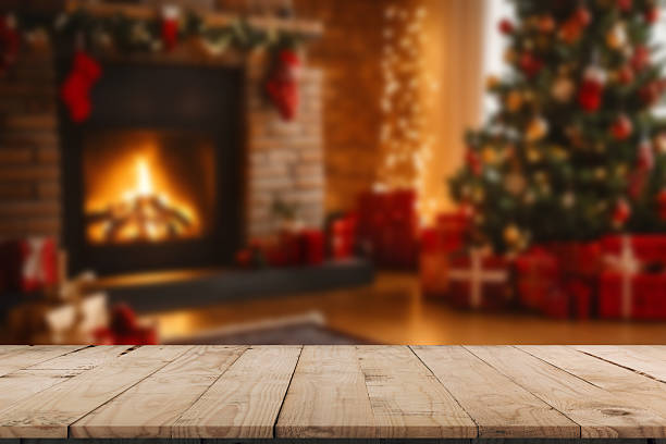istock Empty table in front of christmas tree with decorations background. For product display montage 2218660717