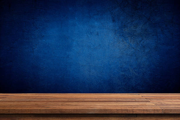 istock Wooden table and sunlit wall, product mockup background template 2218660752