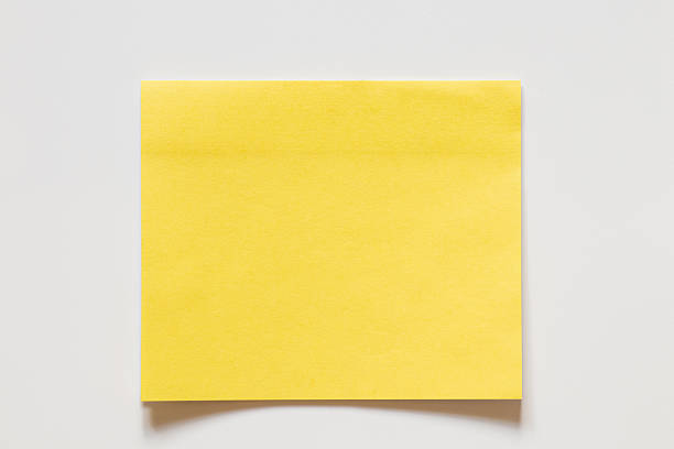 Adhesive note paper on blackboard