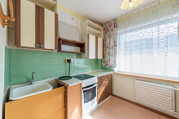 istock Vintage Kitchen with Old Cabinets and Bright Window Lighting 2218662935