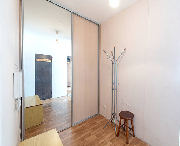 istock Minimalist Interior with Coat Rack and Mirror Wardrobe for Home Design 2218663177