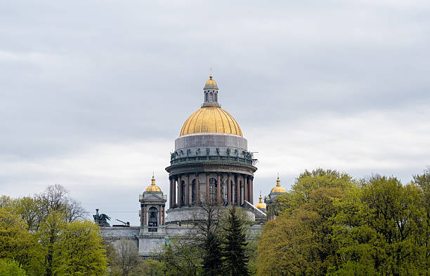 istock St. Isaacs Cathedral Rises Majestically With Its Golden Dome Surrounded by Lush Greenery in the Heart of St. Petersburg During Spring 2218663576
