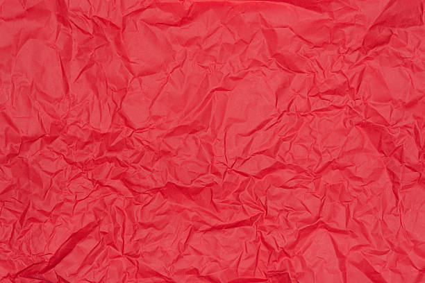 istock Crumpled red paper texture. Vibrant background 2218663715