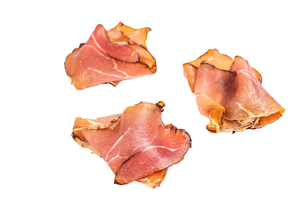 istock Sliced Spanish jamon iberico isolated on white background. top view 2218665594