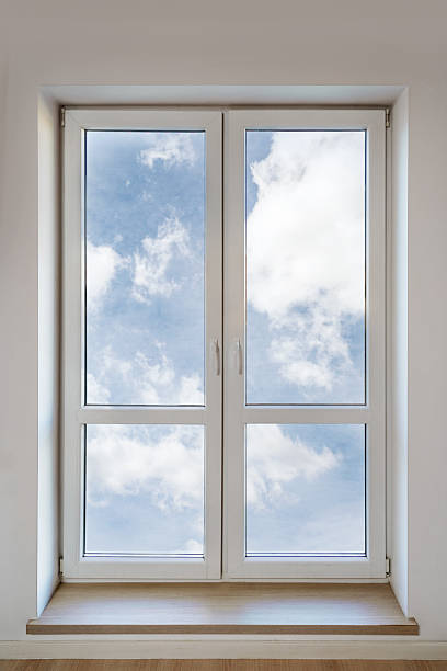 istock Modern white PVC window with double insulated panes in bright living space 2218668221