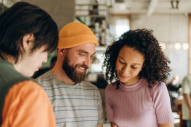 istock Startup team sharing ideas during informal meeting in coworking space 2218670220