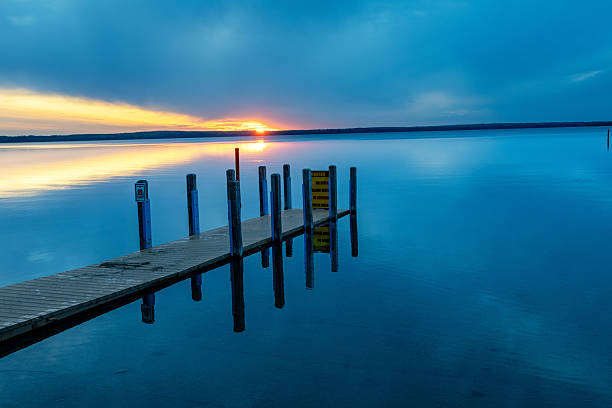 istock Higgins Lake West Boat Launch Pier Sunrise 2218676693
