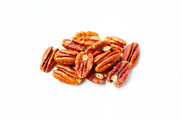 istock Delicious salted pecan nuts scattered. 2218676791