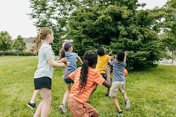 istock Fast Break Fun: Kids Enjoying Basketball Play 2218683052