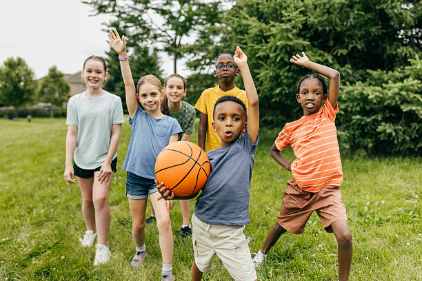 istock Shooting Hoops: Kids’ Basketball Fun in the Park 2218683060
