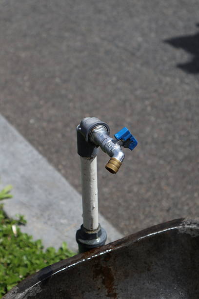 water tap in garden blur background