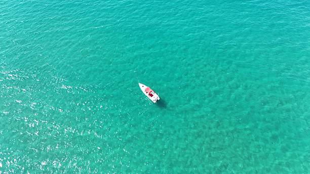 istock Boat turquoise ocean 2218691001