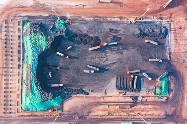istock Aerial shot of trucks transporting coal 2218696958