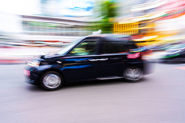 Tokyo black Taxi in Motion