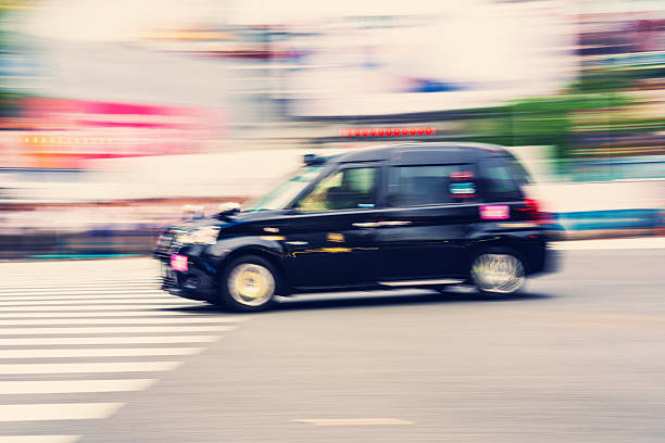 istock Tokyo black Taxi in Motion 2218697158
