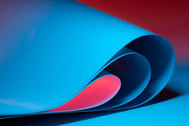 Colorful abstract curves in shades of blue and red creating a dynamic visual experience