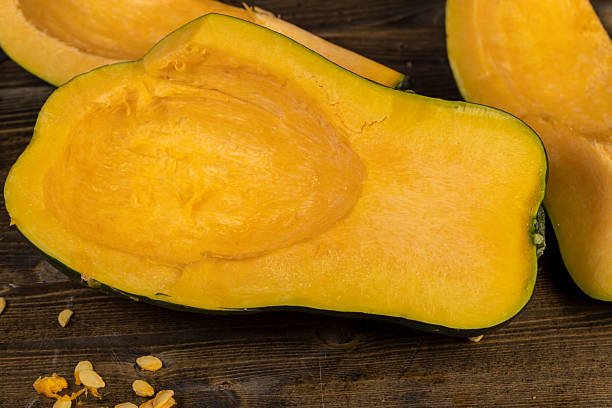 istock freshly cut orange pumpkin with cooking seeds 2218700670