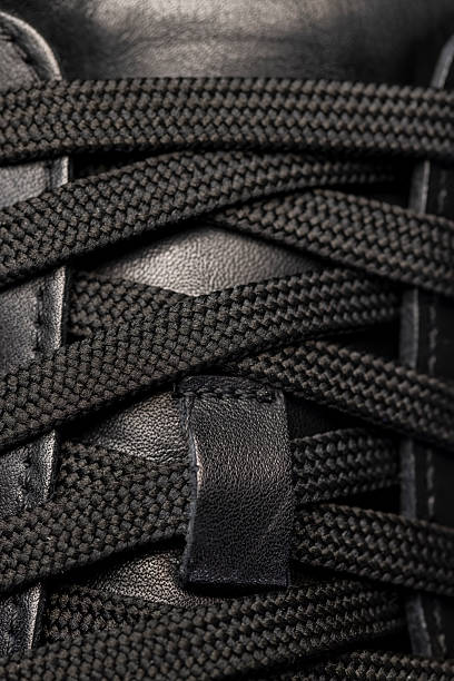 istock black synthetic laces for tying shoes 2218700675