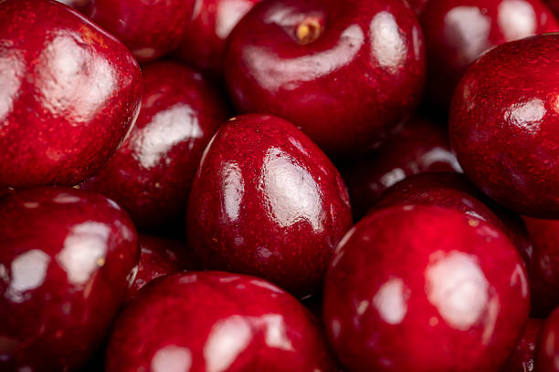 istock ripe red cherry berries , red cherry fruits on the kitchen table 2218700819
