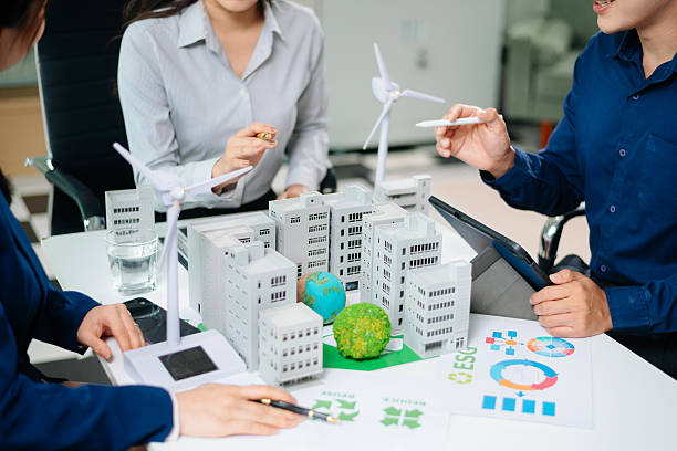 istock Discussion among businesspeople on the latest developments in solar cell panel technology and Solar Energy Environment city 2218701504