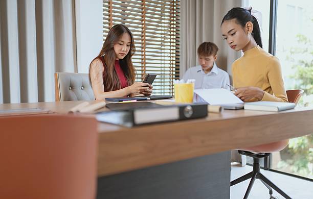 istock group of business people collaborating new project in office 2218702586