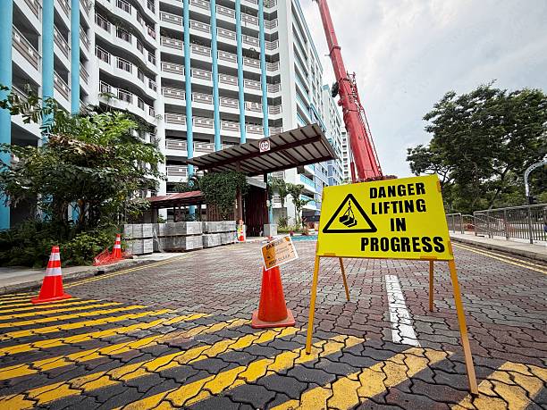 Wide shot of Danger sign work in progress at Singapore residential building