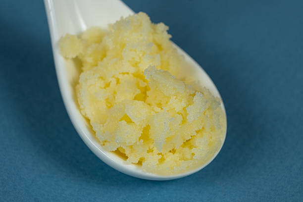 istock Traditional Indian Ghee In Spoon, Golden Texture. 2218722407