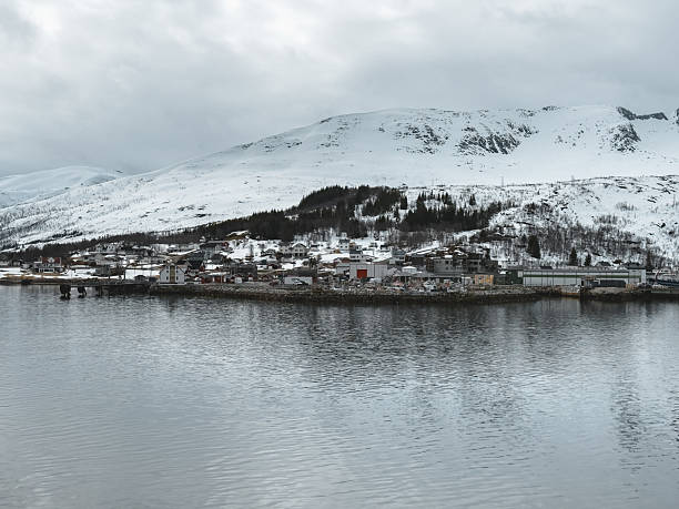 istock Snow-Covered Mountains Reflecting in Calm Fjord 2218722932