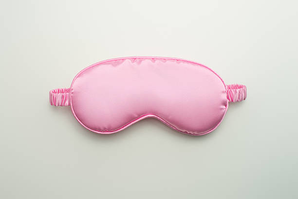 istock Pink sleep mask on white background 2218723401