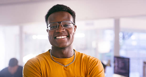 istock Portrait of a Smiling Professional in a Modern Office Environment 2218728048