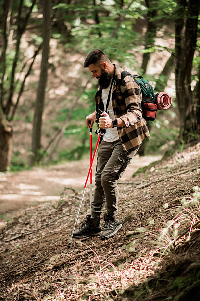 istock Careful Descent on Forest Trail 2218729356