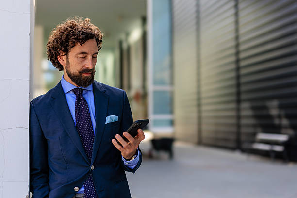 istock Business Leader Engaged with Smartphone 2218732305