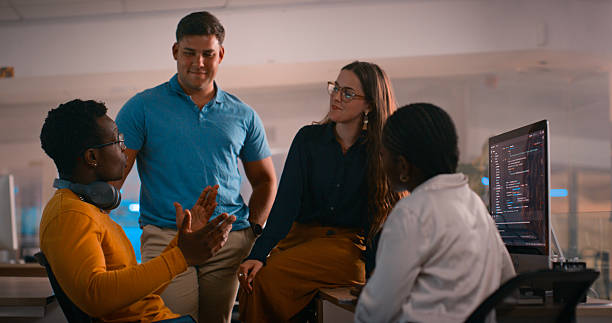 istock Team Collaboration and Discussion in a Modern Office Environment With a Focus on Technology 2218732528