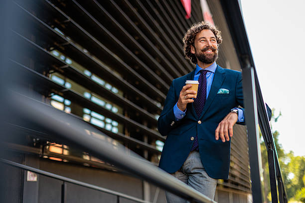istock Urban Professional Starting the Day with Coffee and Confidence 2218732788