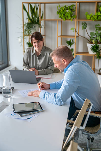 istock Caucasian Business Professionals Collaborating in Modern Office 2218732939