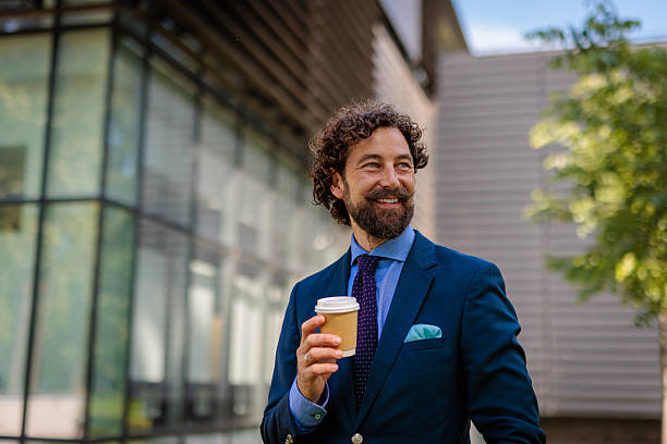 istock Relaxed Entrepreneur Smiling During Morning Coffee 2218733044