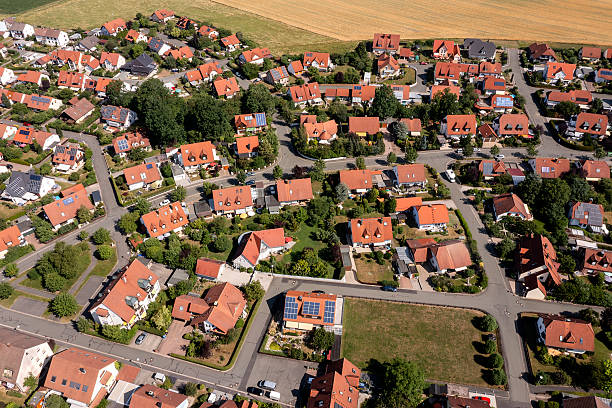 istock Red roof houses from above 2218738631